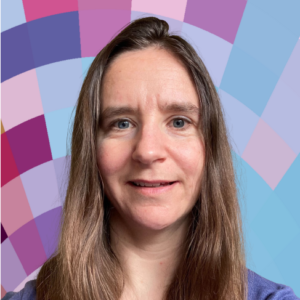 Headshot of Anna Mills, a smiling white woman with long brown hair, wearing a purple top, on top of a MYFest background of colorful pink, purple and blue four-sided shapes spiraling out from the center.