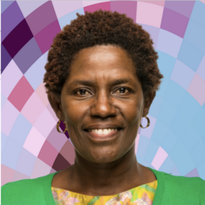 Headshot of Irene Maweu, a smiling Black woman with short hair, wearing a colorful top, a bright green sweater, and small thick hoop earrings on top of a MYFest background of colorful pink, purple and blue four-sided shapes spiraling out from the center.