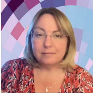 Trayle’s photo shows her head and shoulders. She’s a white lady with straight blonde hair to her chin. She’s sorta smiling, wearing glasses with no frames, and a silver infinity necklace.