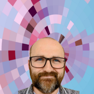 Headshot of Lance Eaton, a white man with a slight smile, black eyeglasses, and brown hair, beard, and mustache on top of a MYFest background of colorful pink, purple and blue four-sided shapes spiraling out from the center.
