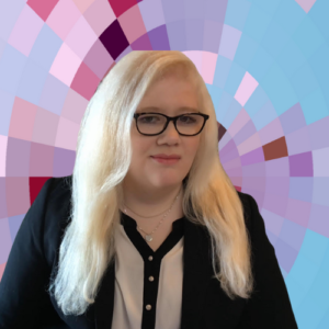 Headshot of Lobna Hassan, a smiling white woman with dark glasses and light hair, wearing a dark suit jacket and black and white shirt on top of a MYFest background of colorful pink, purple and blue four-sided shapes spiraling out from the center.
