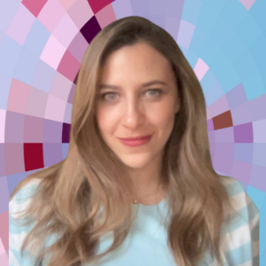 Headshot of Nadine, a smiling woman with long light hair and green eyes, wearing a striped white and blue sweater on top of a MYFest background of colorful pink, purple and blue four-sided shapes spiraling out from the center.